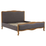 EMILIA Super Kingsize Bed in grey fabric with oak wood trims, featuring shaped headboard and footboard for a timeless and elegant bedroom centerpiece.