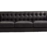 Alt text: VURO Three Seat Black Leather Sofa in antique ebony leather with button tufted back, Chesterfield-inspired three-seat sofa with oak wood legs, elegant black leather sofa for modern and classic interiors.