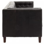 Alt text: VURO Three Seat Black Leather Sofa in antique ebony leather with button tufted back, Chesterfield-inspired three-seat sofa with oak wood legs, elegant black leather sofa for modern and classic interiors.