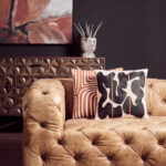 CHALIE Three-Seat Tan Leather Sofa with vintage button-tufted detailing, upholstered in rustic tan leather, designed for timeless elegance and comfort.