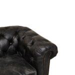 IBERIA Three Seat Ebony Leather Sofa in Chesterfield design with deep button tufting, rolled arms, and ebony leather upholstery, classic three-seat sofa with vintage castor feet.