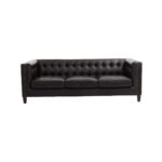 VURO Three Seat Black Leather Sofa in antique ebony leather with button tufted back, Chesterfield-inspired three-seat sofa with oak wood legs, elegant black leather sofa for modern and classic interiors.
