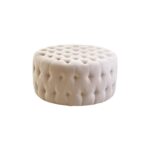 LUCRA Beige Velvet Footstool – round beige velvet footstool with button tufting and foam padding.