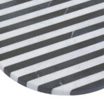 SOMA Small Black and White Marble Round Cheese Board featuring striped black and white marble design displayed with cheese and charcuterie.