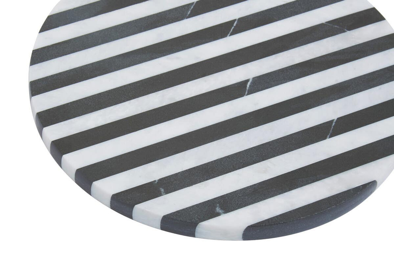 SOMA Small Black and White Marble Round Cheese Board featuring striped black and white marble design displayed with cheese and charcuterie.