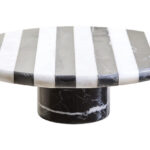 SOMA Large Black and White Marble Cake Stand with striped marble top and cylindrical black marble base displayed with cakes and desserts.