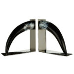 EVARA Set Of Two Buffalo Horn Bookends with black horn and steel stand, showing natural white streaks