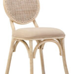 WALTON White Wash Elm Wood Dining Chair featuring cane woven backrest and beige cushioned seat styled in a bright modern dining room.