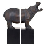 NORIA Set of 2 Hippo Bookends in bronze finish on black bases displayed on a modern bookshelf.