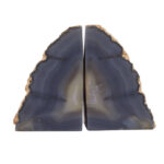 LUVIA Agate Grey and Gold Bookends featuring natural agate texture with gold edges displayed on a modern bookshelf.