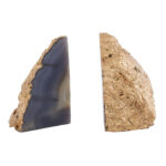 LUVIA Agate Grey and Gold Bookends featuring natural agate texture with gold edges displayed on a modern bookshelf.