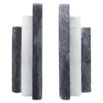 BELOR Black and White Marble Bookends with layered sculptural design displayed on a modern bookshelf.