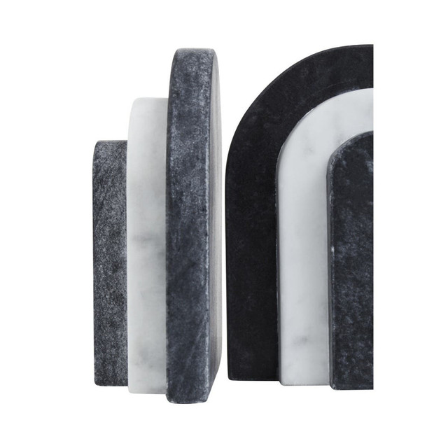 BELOR Black and White Marble Bookends with layered sculptural design displayed on a modern bookshelf.