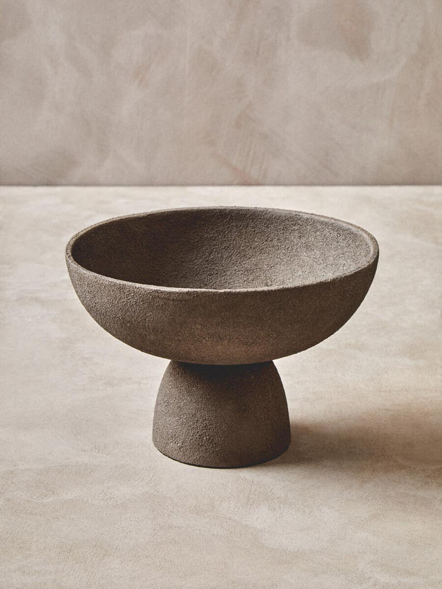 VIRA Small Textured Grey Aluminium Pedestal Bowl with elevated base and tactile finish displayed on a modern console table.