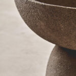 VIRA Small Textured Grey Aluminium Pedestal Bowl with elevated base and tactile finish displayed on a modern console table.