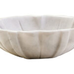 LOTUS Small White Marble Bowl with sculpted lotus-petal edges and polished finish displayed on a modern console table.