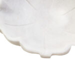 LOTUS Small White Marble Bowl with sculpted lotus-petal edges and polished finish displayed on a modern console table.