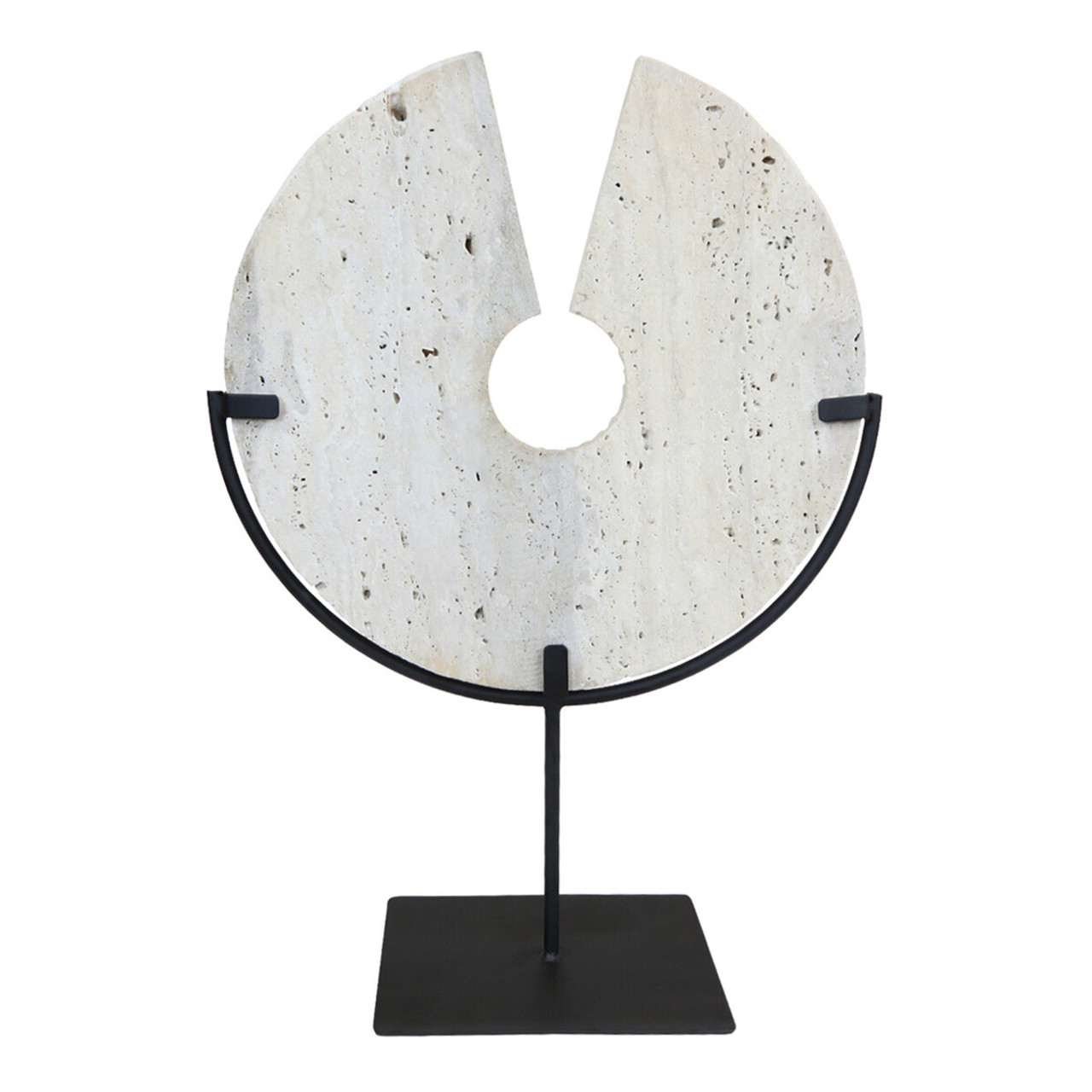 TIBOR Travertine Disc Sculpture featuring a hand-carved circular travertine stone on a sleek black metal base, displayed in a modern living room.