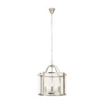 HAMPSTEAD 6 Bulb Chrome Pendant Light featuring clear glass panels and chrome frame suspended above a modern dining table.