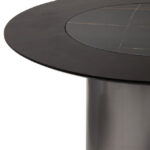 HUGO Round Veneer and Ceramic Dining Table with black marble-effect lazy susan and grey brushed stainless steel base displayed in a modern dining room.