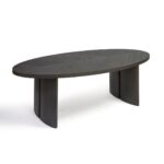 AUSTIN Oval Dining Table in black-brown oak with sculptural end legs and elegant oval top in a modern dining room setting.