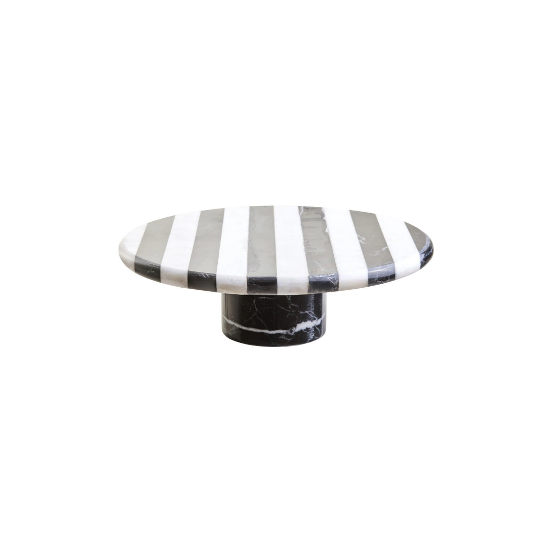 SOMA Large Black and White Marble Cake Stand with striped marble top and cylindrical black marble base displayed with cakes and desserts.