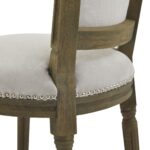 Ripley Grey Dining Chair with woven upholstery, washed wood frame, and silver stud detailing.