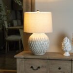LATTICE Ceramic Table Lamp with neutral cream lattice base and natural linen shade for versatile interior décor.