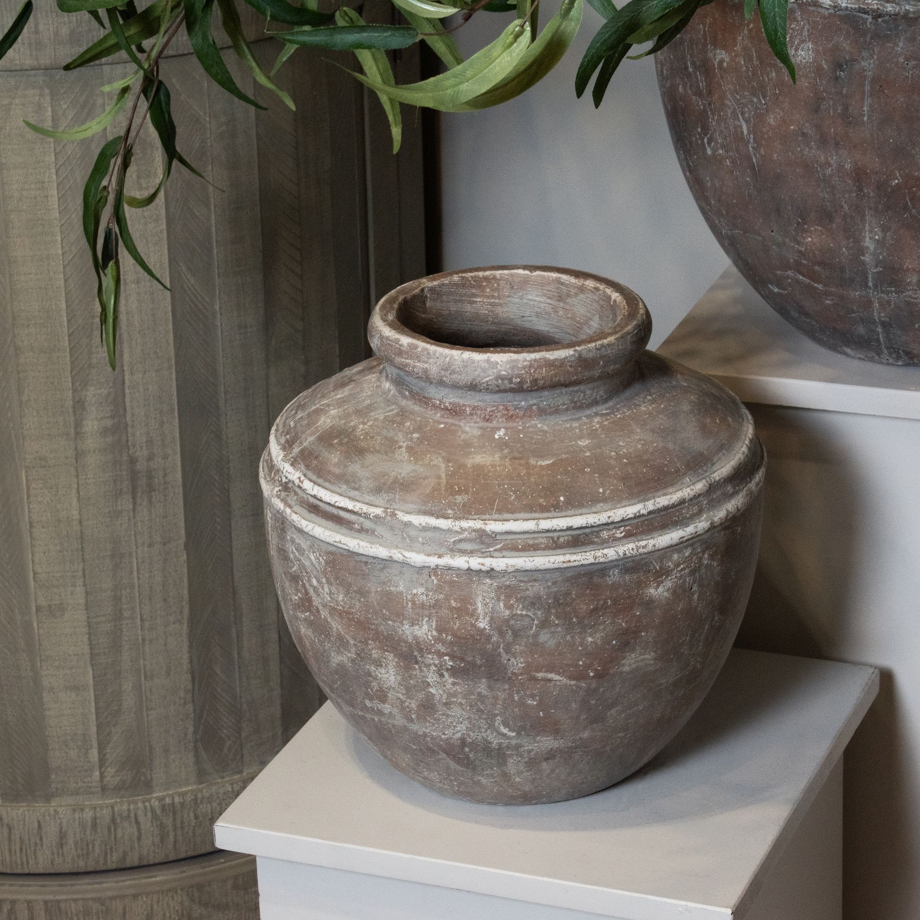 SIENA Brown Water Pot – Handcrafted ceramic urn-style water pot with distressed brown finish, suitable for live or artificial arrangements.