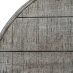 Rutland Collection round wooden coffee table in modern brown finish.