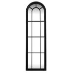 Tall black arched window-style mirror with timber frame