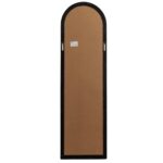 Tall black arched window-style mirror with timber frame