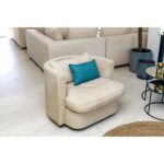 JULES Off-White Armchair – modern leather armchair with semi-circular backrest and black metal frame, designed for stylish comfort.