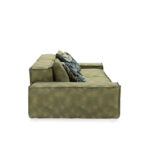 HULK Sofa in olive green, two-seater modular design with plush cushions and botanical accent pillows