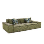 HULK Sofa in olive green, two-seater modular design with plush cushions and botanical accent pillows