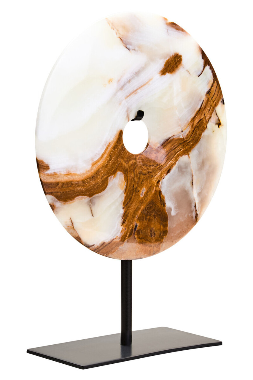 Polished round onyx disc in natural earthy tones displayed on a black metal stand.