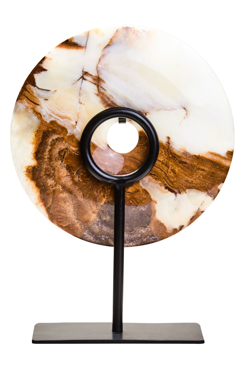 Polished round onyx disc in natural earthy tones displayed on a black metal stand.