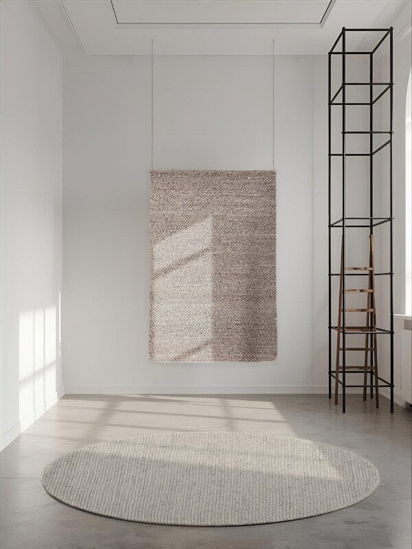 Chocolate marble pedestal bowl with natural veining and a round elevated base.