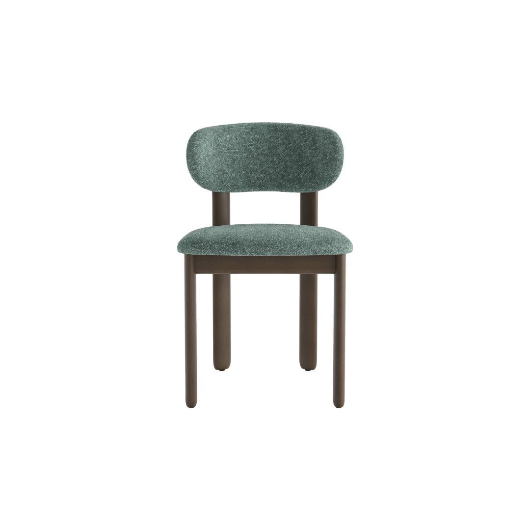 Upholstered dining chair with curved backrest in green fabric and shaded grey-brown beech wood frame.