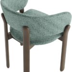 Upholstered dining chair with curved backrest in green fabric and shaded grey-brown beech wood frame.