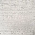 White textured wall art with vertical ribbed detailing and a semi-circular relief in a wooden frame.