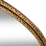 Medium wall mirror with gold dimpled textured frame and reflective glass, decorative mirror for modern and classic interiors.