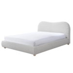 WAVE bed in natural weave fabric with curved upholstered headboard and round wooden legs in neutral modern bedroom.