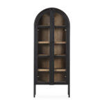 James ashwood display cabinet with black frame, walnut interior and glass doors in tall arched design.
