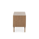 Contour wooden TV stand with sculptural drawer fronts in sand-toned cedar wood finish.