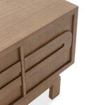 Contour wooden TV stand with sculptural drawer fronts in sand-toned cedar wood finish.
