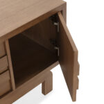 Contour wooden TV stand with sculptural drawer fronts in sand-toned cedar wood finish.