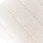 Empress cream faux fur feather filled cushion with soft velvet texture for cosy interior styling.