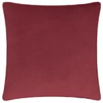 Amor velvet piped cushion in red with bold Mexican inspired pattern and feather filling.
