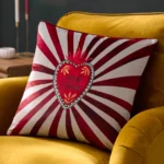 Amor velvet piped cushion in red with bold Mexican inspired pattern and feather filling.